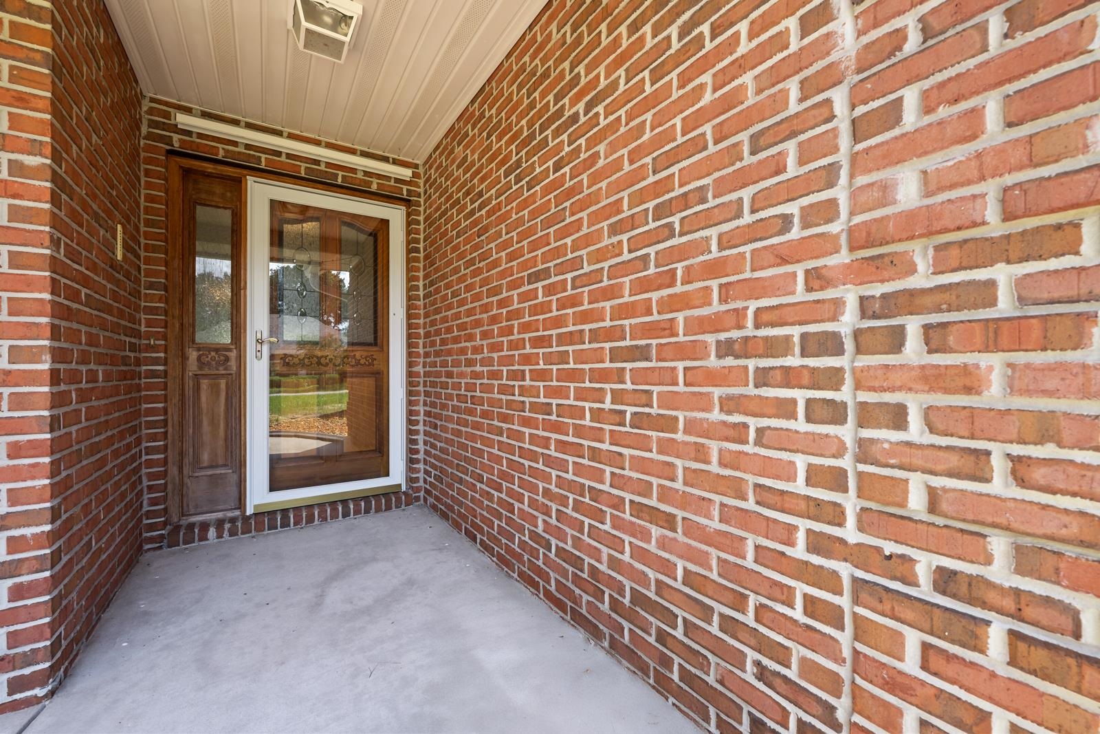 512 Moultrie Wells Road St. Augustine, FL 32086 - Photo 5 of 51 a view of a brick wall