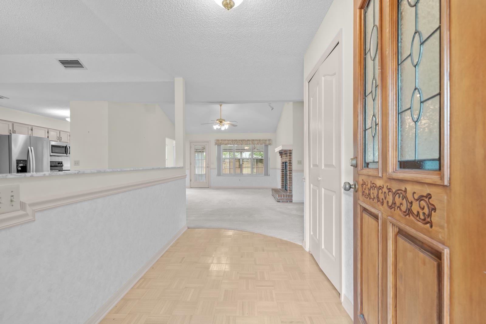 512 Moultrie Wells Road St. Augustine, FL 32086 - Photo 6 of 51 a view of a hallway with windows