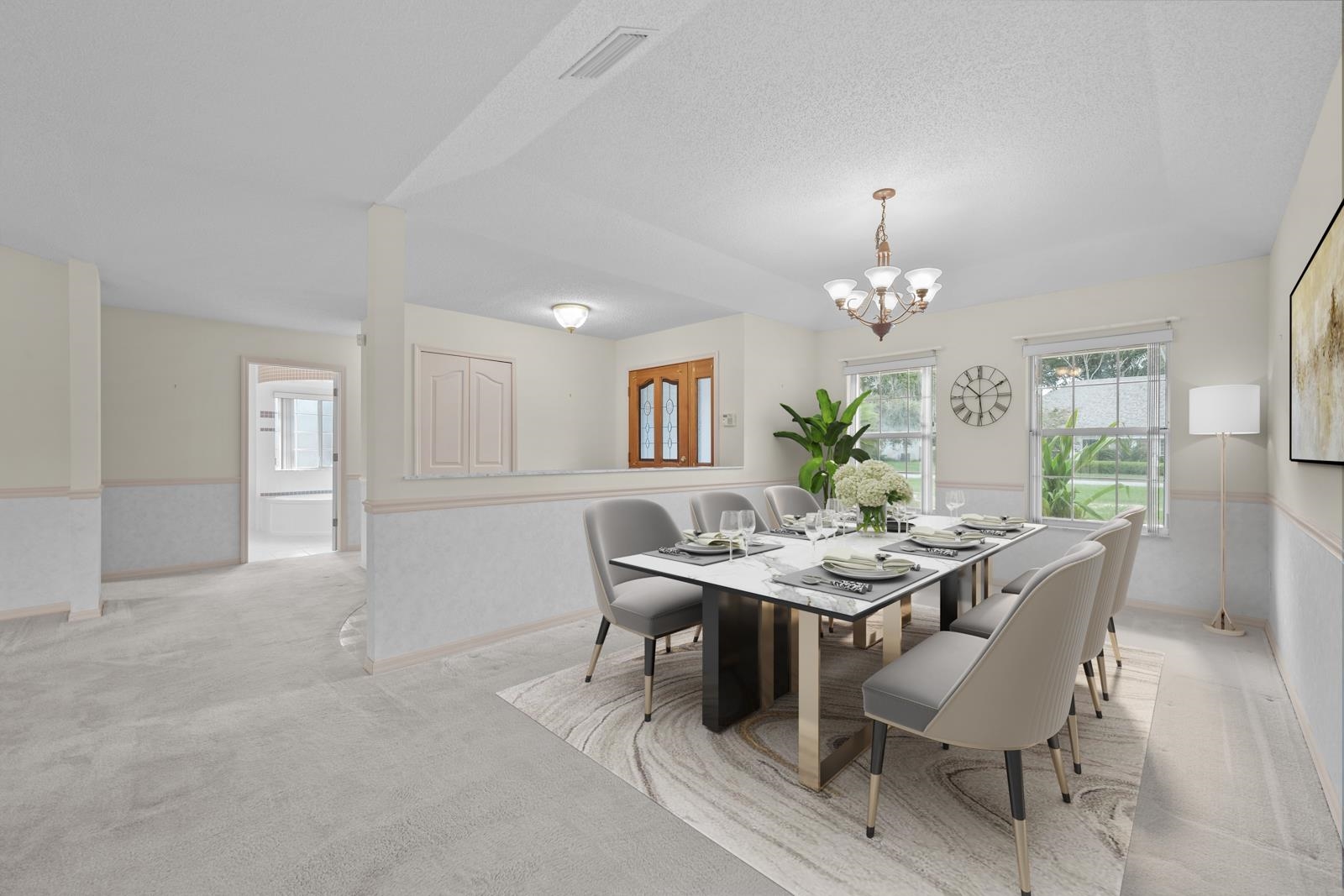512 Moultrie Wells Road St. Augustine, FL 32086 - Photo 9 of 51 a view of a dining room with furniture and chandelier