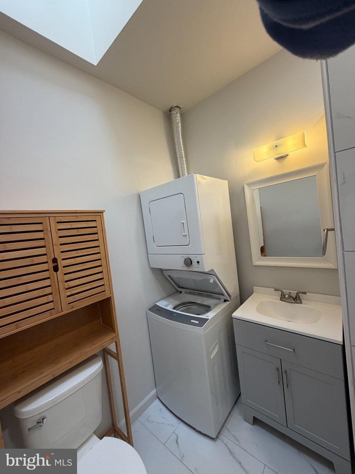 600 Keefer Place Northwest, Unit 3 Washington, DC 20010 - Photo 13 of 21 Compact and modern laundry space.