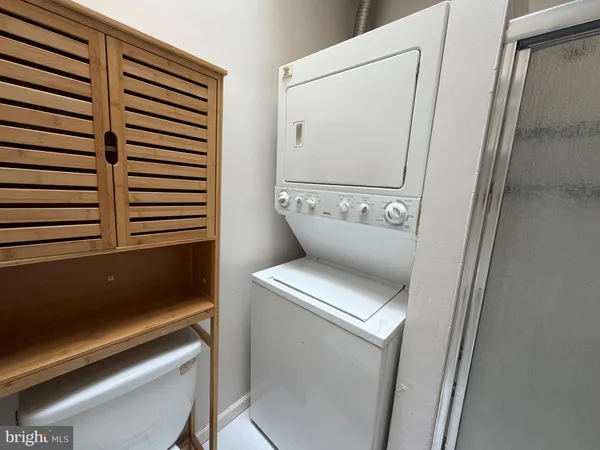 a utility room with washer and dryer