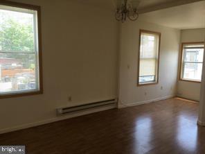 600 Keefer Place Northwest, Unit 3 Washington, DC 20010 - Photo 2 of 12 Bright and airy living space with natural light.