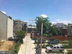 600 Keefer Place Northwest, Unit 3 Washington, DC 20010 - Photo 21 of 21 Urban landscape with greenery and development.