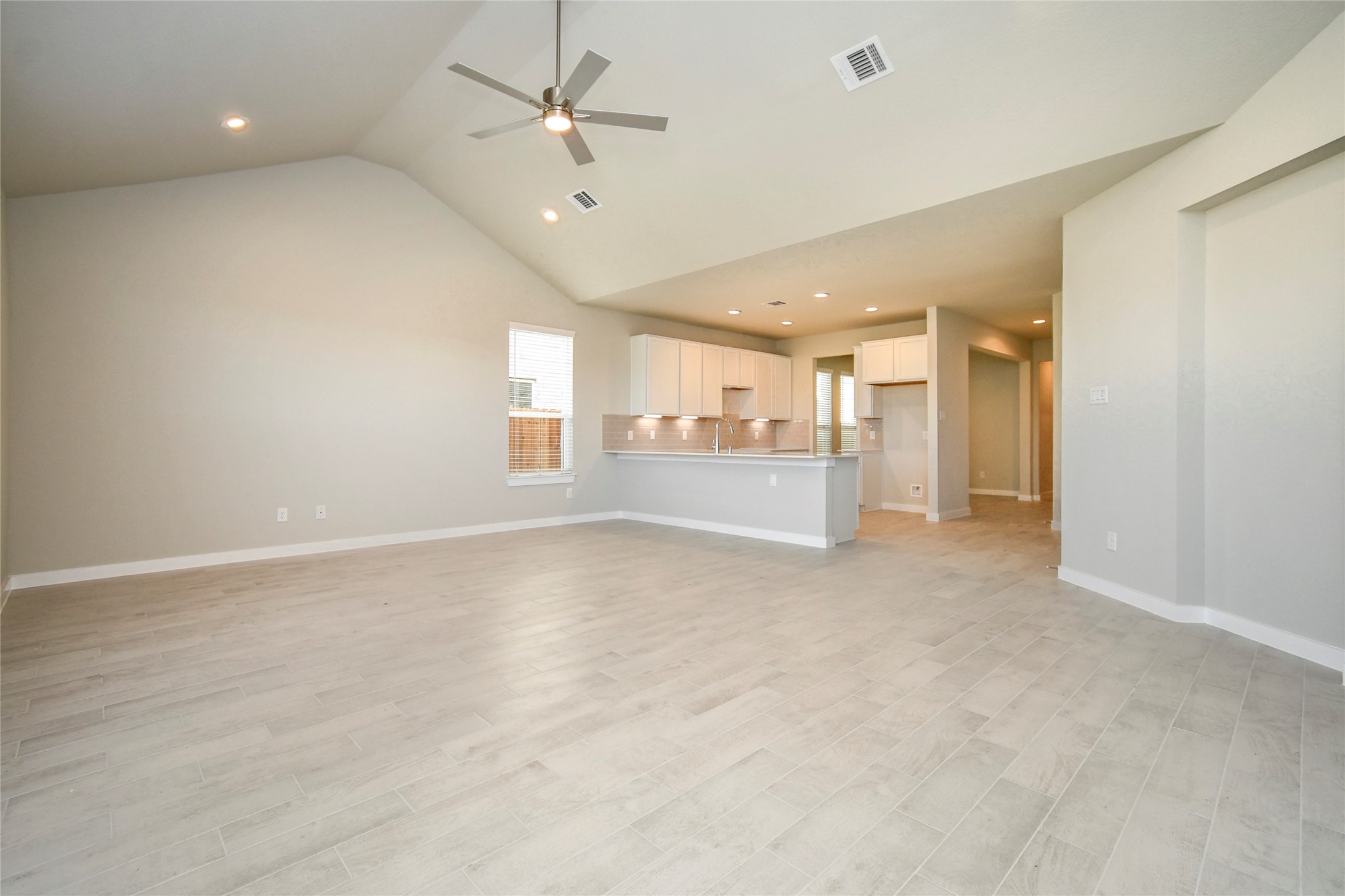 11110 Crocus Drive Houston, TX 77044 - Photo 13 of 22 an empty room with a empty space and windows