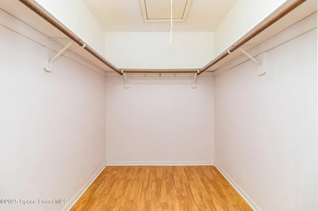 a view of a room with racks on the wall