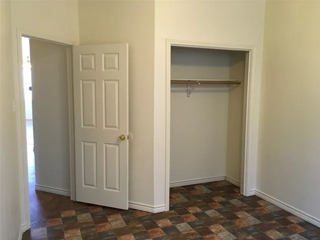 a view of a livingroom with wooden floor