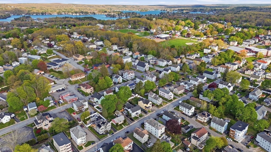 12 Whitcomb Street Webster, MA 01570 - Photo 6 of 40 an aerial view of multiple house with yard