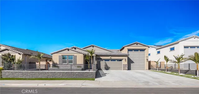 a view of multiple houses with a big yard