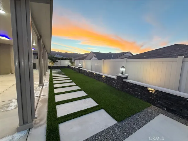 an aerial view of a house with a flat screen tv