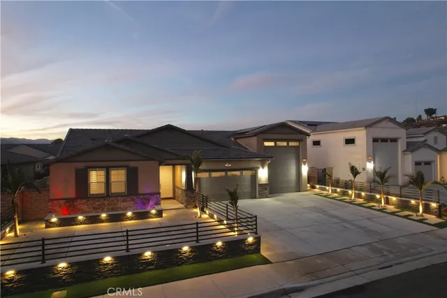 a view of a building and car parked on the road