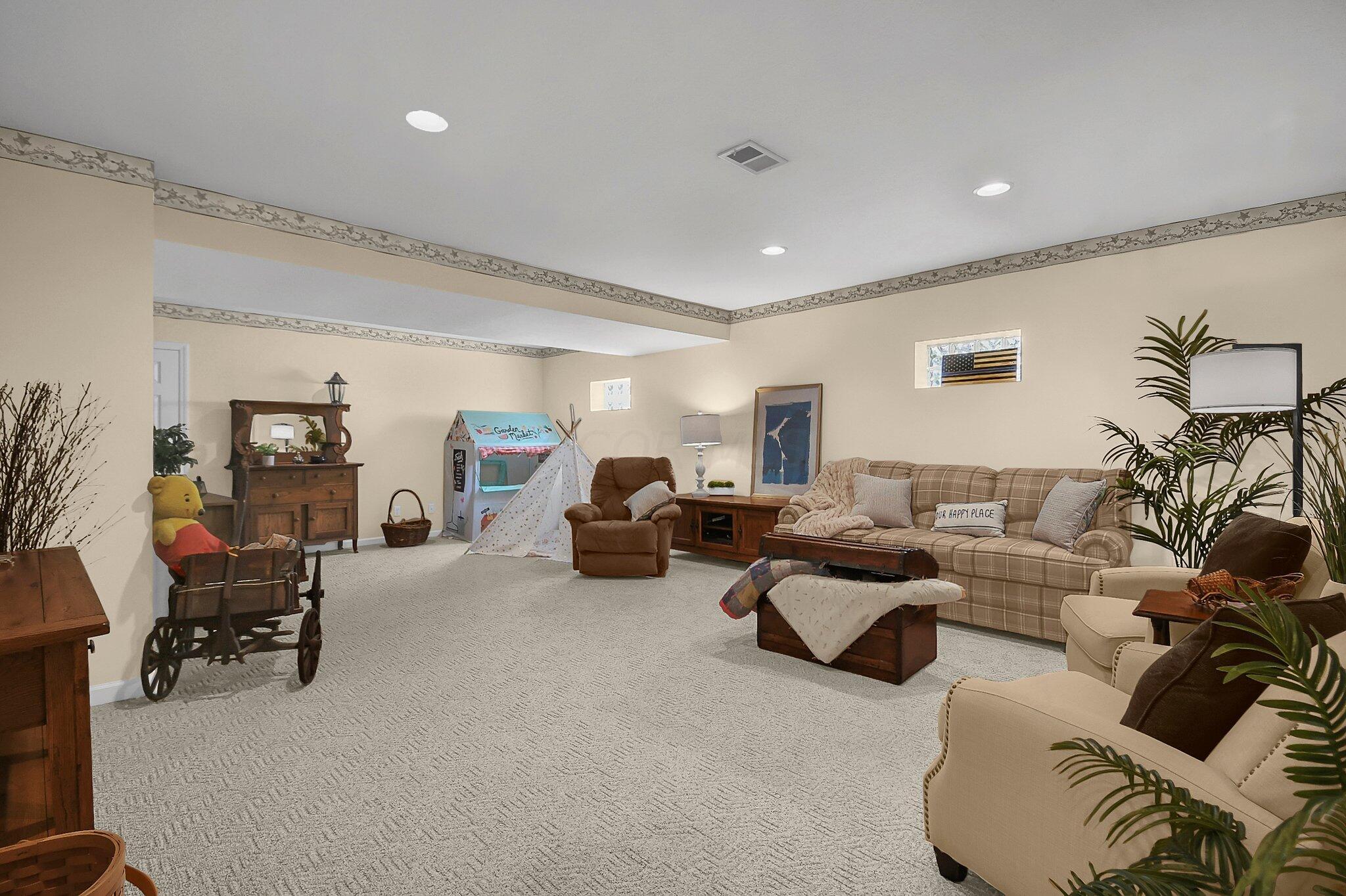 1717 Cedar Hill Road Lancaster, OH 43130 - Photo 24 of 36 Wow! HUGE finished lower level, plenty of space for entertaining and family activities.