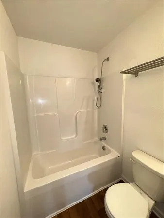 a bathroom with a sink a mirror and a shower