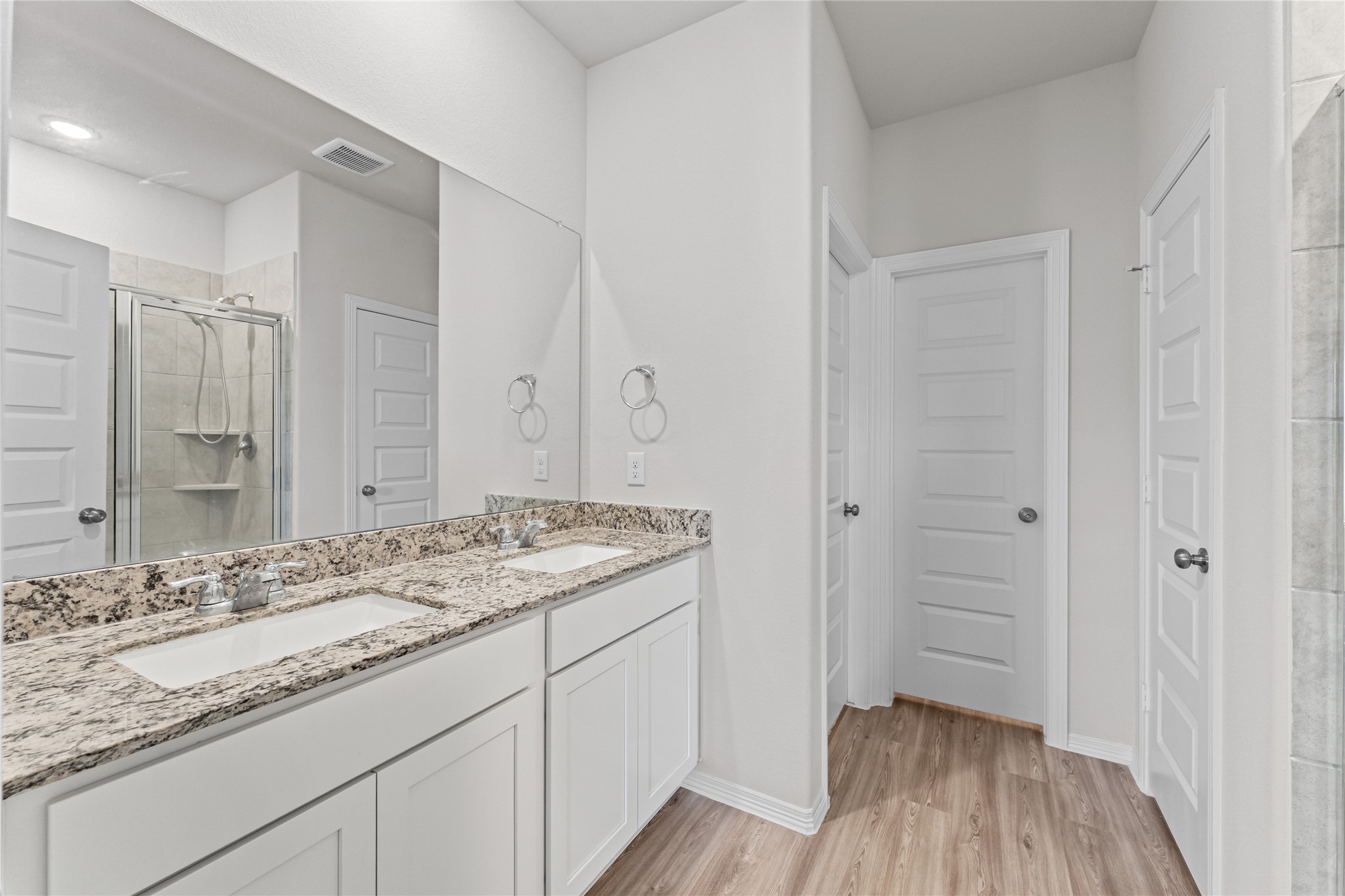 23326 Spring Genesis Lane Katy, TX 77493 - Photo 25 of 32 a bathroom with a sink and a mirror