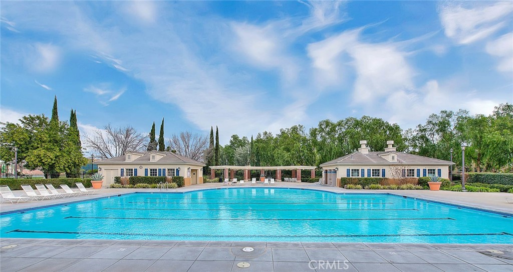 8150 West Preserve Loop Chino, CA 91708 - Photo 38 of 51 a front view of a house with swimming pool