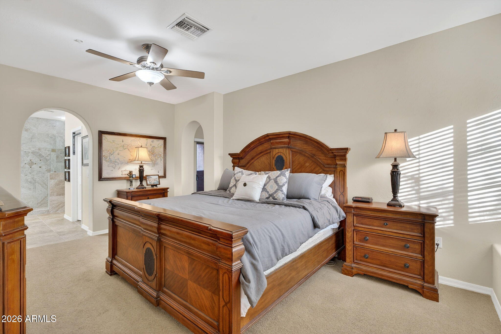 3935 East Rough Rider Road, Unit 1088 Phoenix, AZ 85050 - Photo 13 of 49 Large primary bedroom