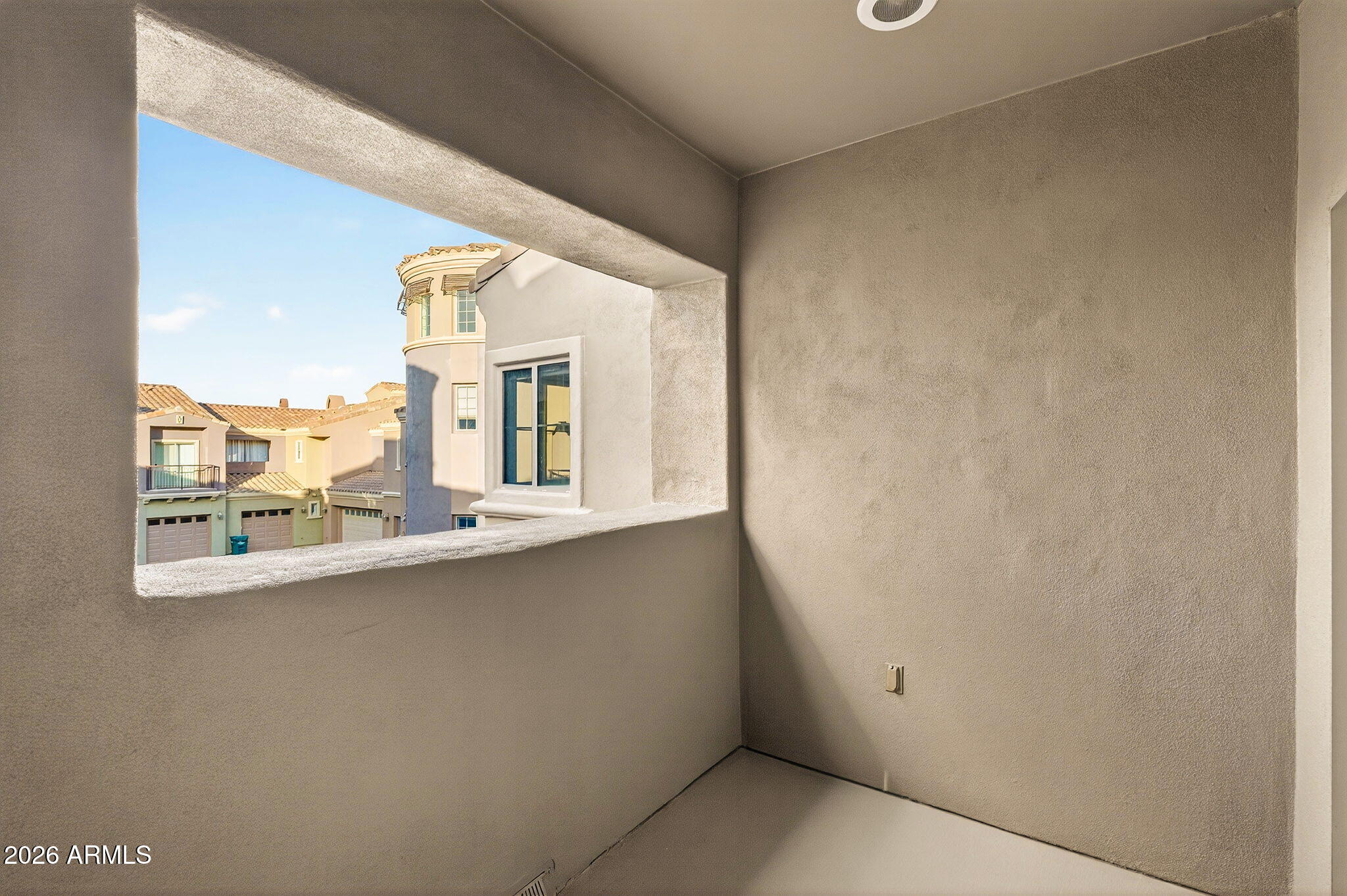 3935 East Rough Rider Road, Unit 1088 Phoenix, AZ 85050 - Photo 21 of 49 Private balcony off primary bedroom