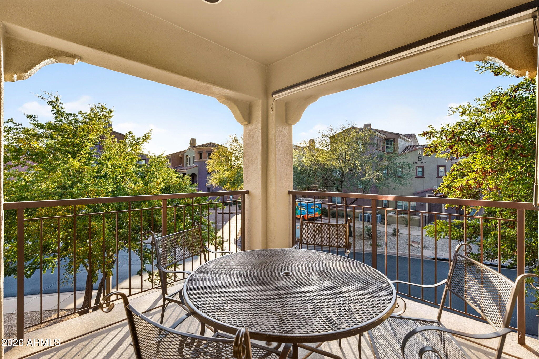 3935 East Rough Rider Road, Unit 1088 Phoenix, AZ 85050 - Photo 22 of 49 Patio off family room