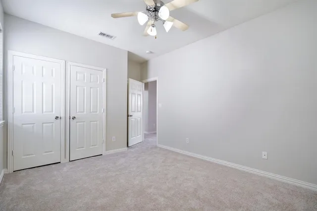a bathroom with a double vanity sink mirror double and shower