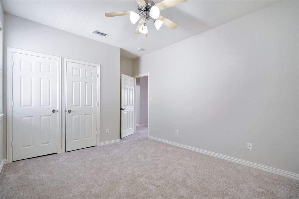 6407 Capulet Place Dallas, TX 75252 - Photo 28 of 33 a view of an empty room with a window