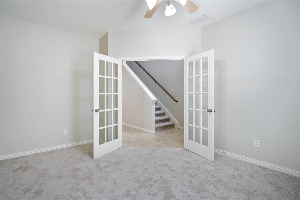 6407 Capulet Place Dallas, TX 75252 - Photo 8 of 33 a view of an entryway with stairs