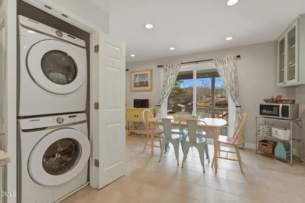 a view of a living room and dining room