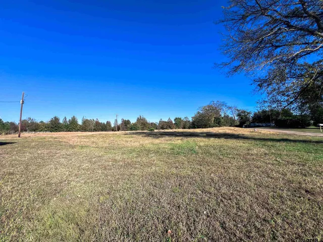 a view of an ocean with sunset view