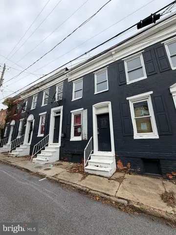 a front view of a building with a entryway
