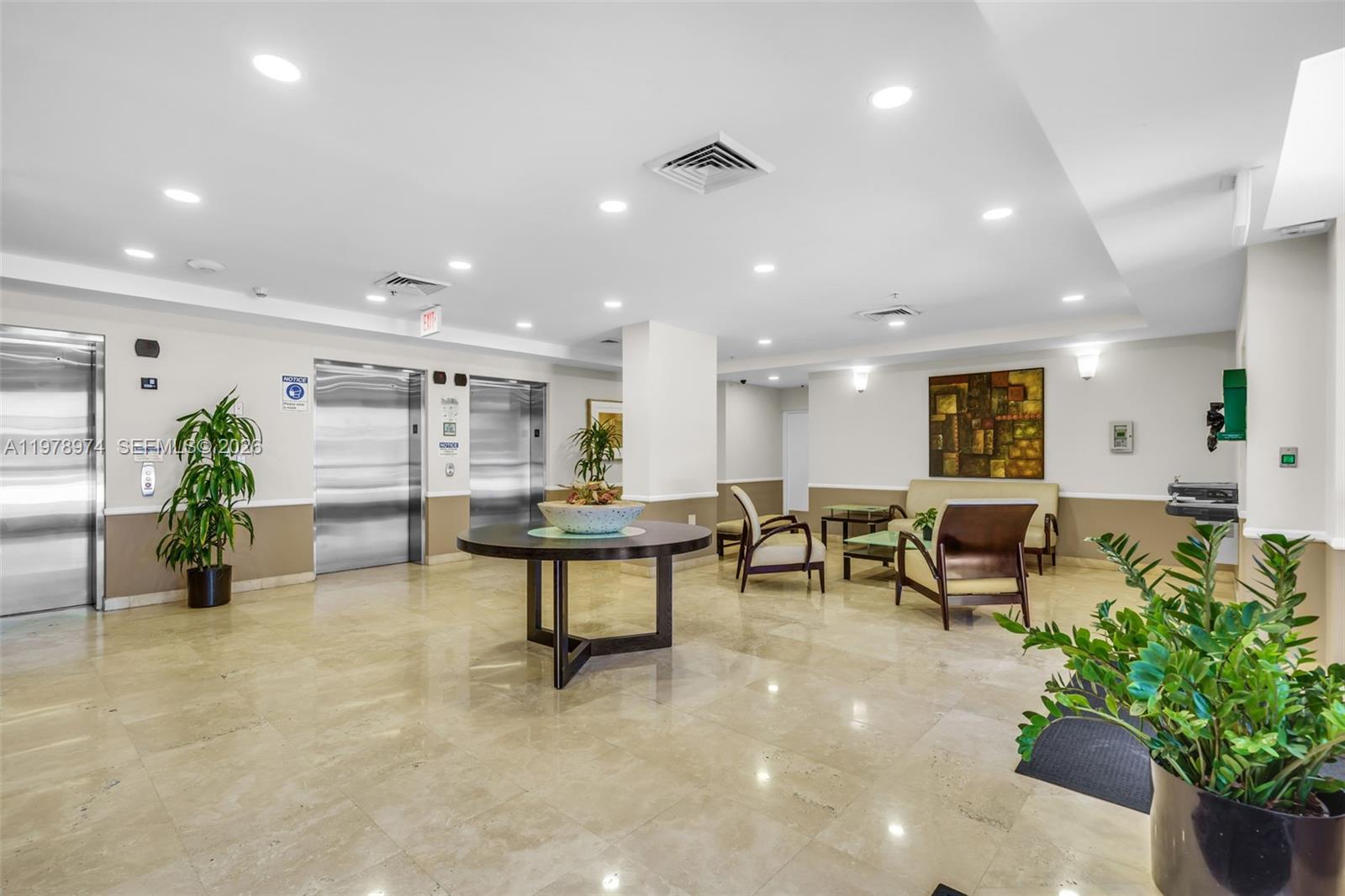 900 Southwest 8th Street, Unit 1603 Miami, FL 33130 - Photo 32 of 32 a living room with furniture and a potted plant