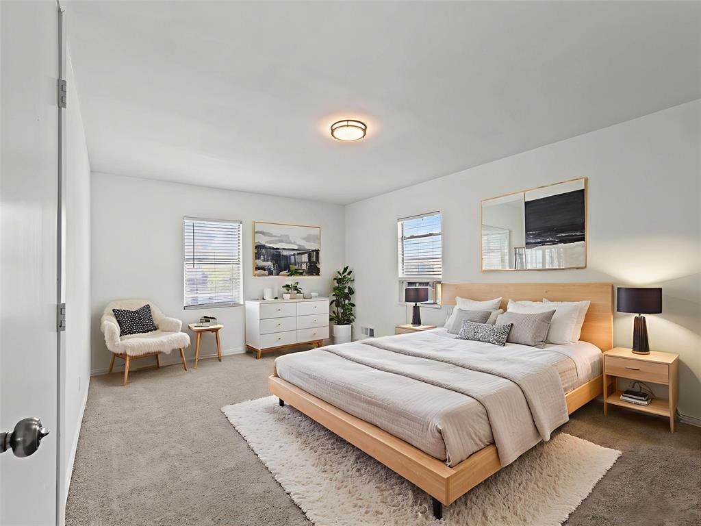 826 Ryan Road Dallas, TX 75224 - Photo 24 of 34 a bedroom with a bed and furniture