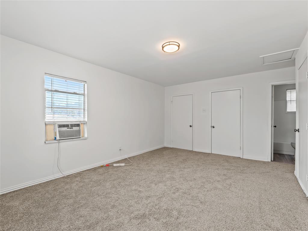 826 Ryan Road Dallas, TX 75224 - Photo 26 of 34 an empty room with windows