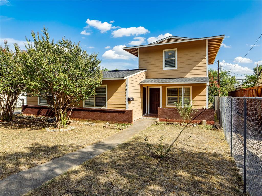 826 Ryan Road Dallas, TX 75224 - Photo 3 of 34 a front view of a house with a yard