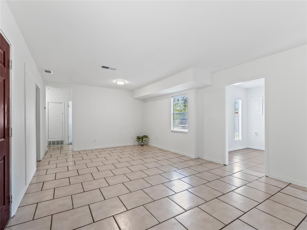 826 Ryan Road Dallas, TX 75224 - Photo 5 of 34 a view of an empty room and window