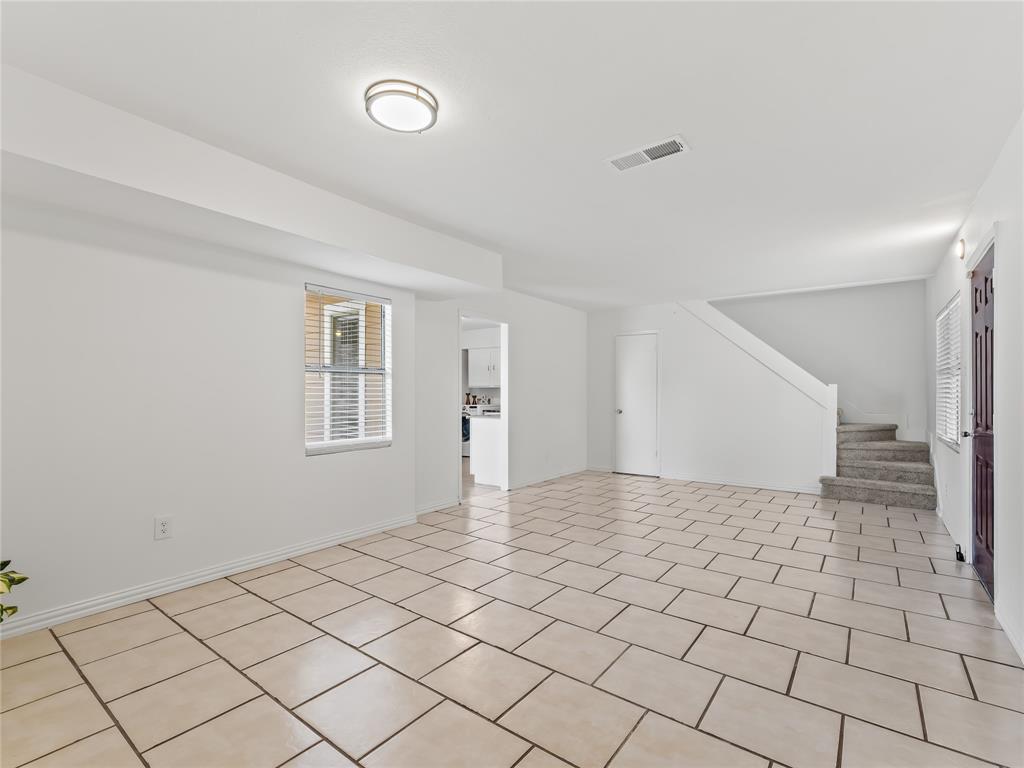 826 Ryan Road Dallas, TX 75224 - Photo 7 of 34 a view of an empty room and window