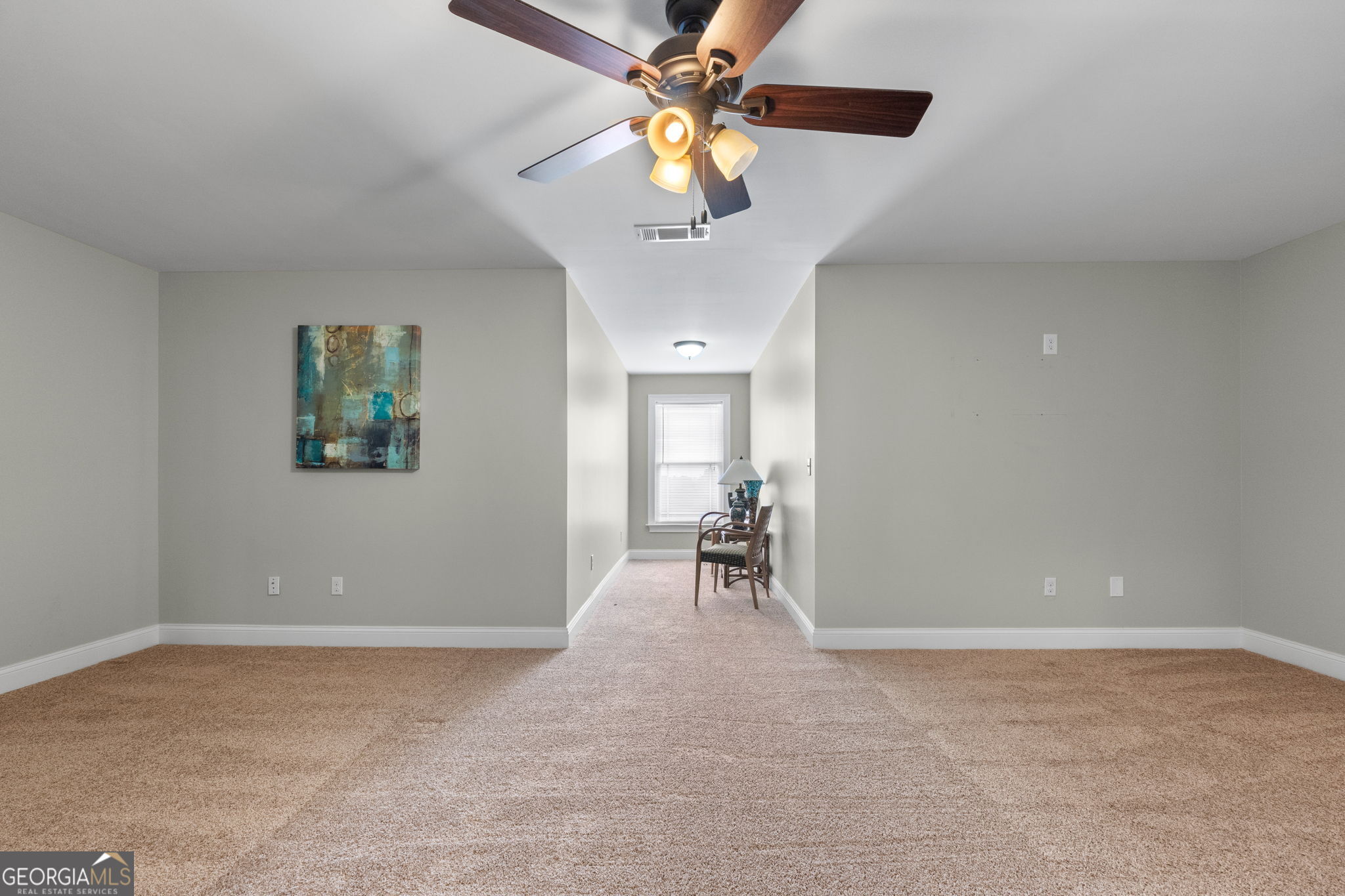 735 Firetower Road Thomaston, GA 30286 - Photo 25 of 112 a view of a livingroom with a chandelier fan