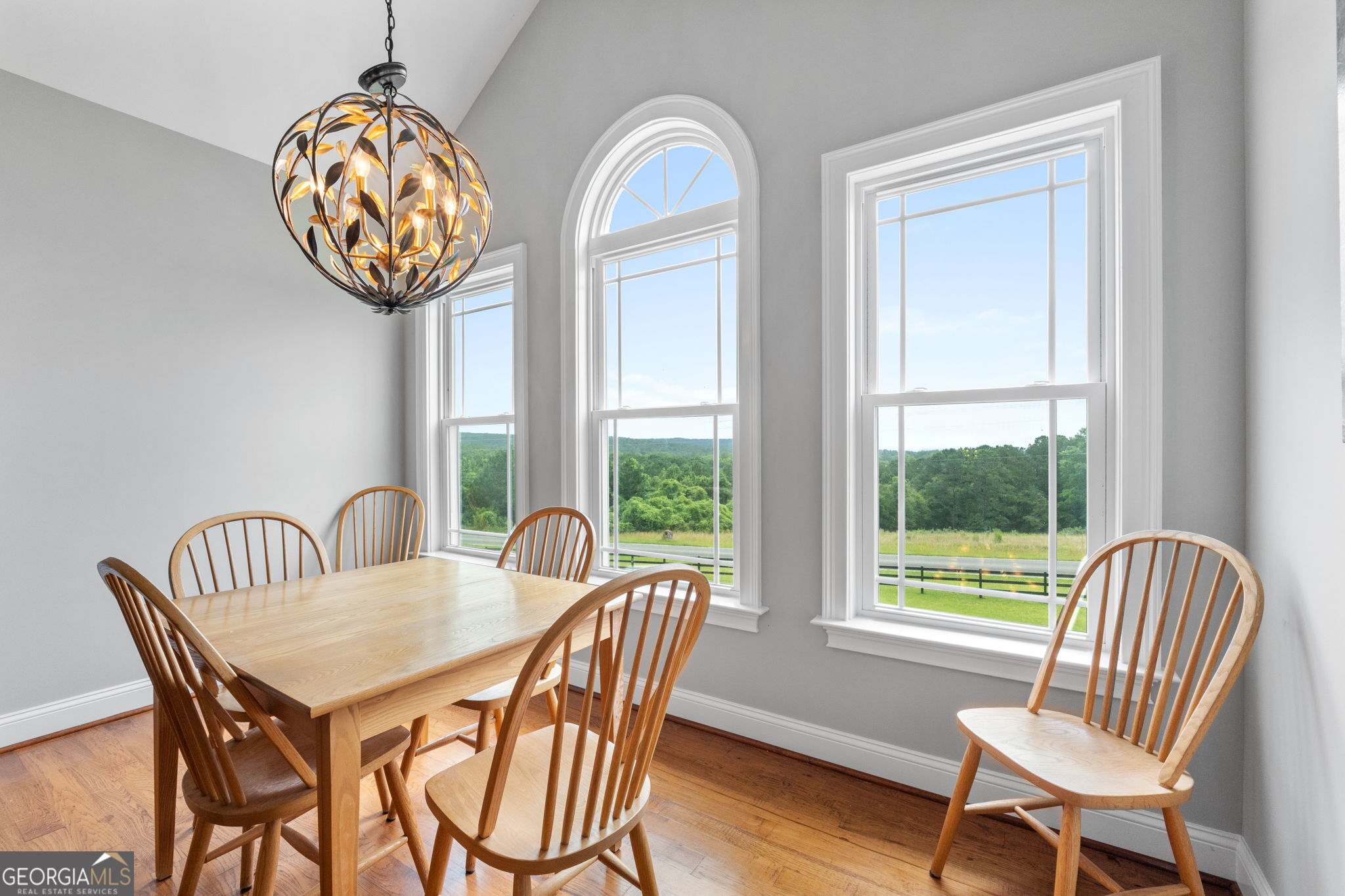 735 Firetower Road Thomaston, GA 30286 - Photo 29 of 112 a view of a dining room with furniture window and wooden floor