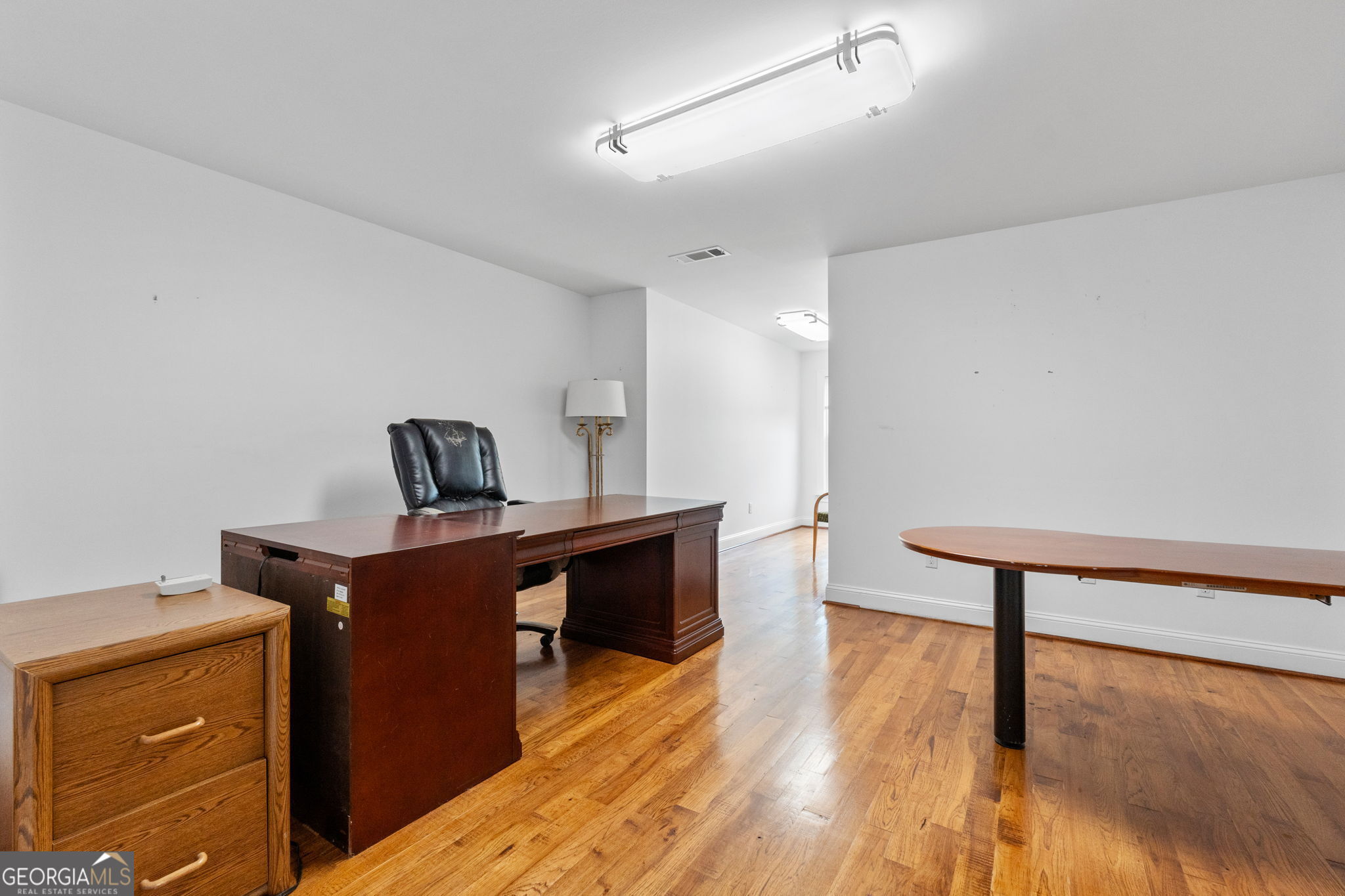 735 Firetower Road Thomaston, GA 30286 - Photo 30 of 112 a view of workspace with wooden floor