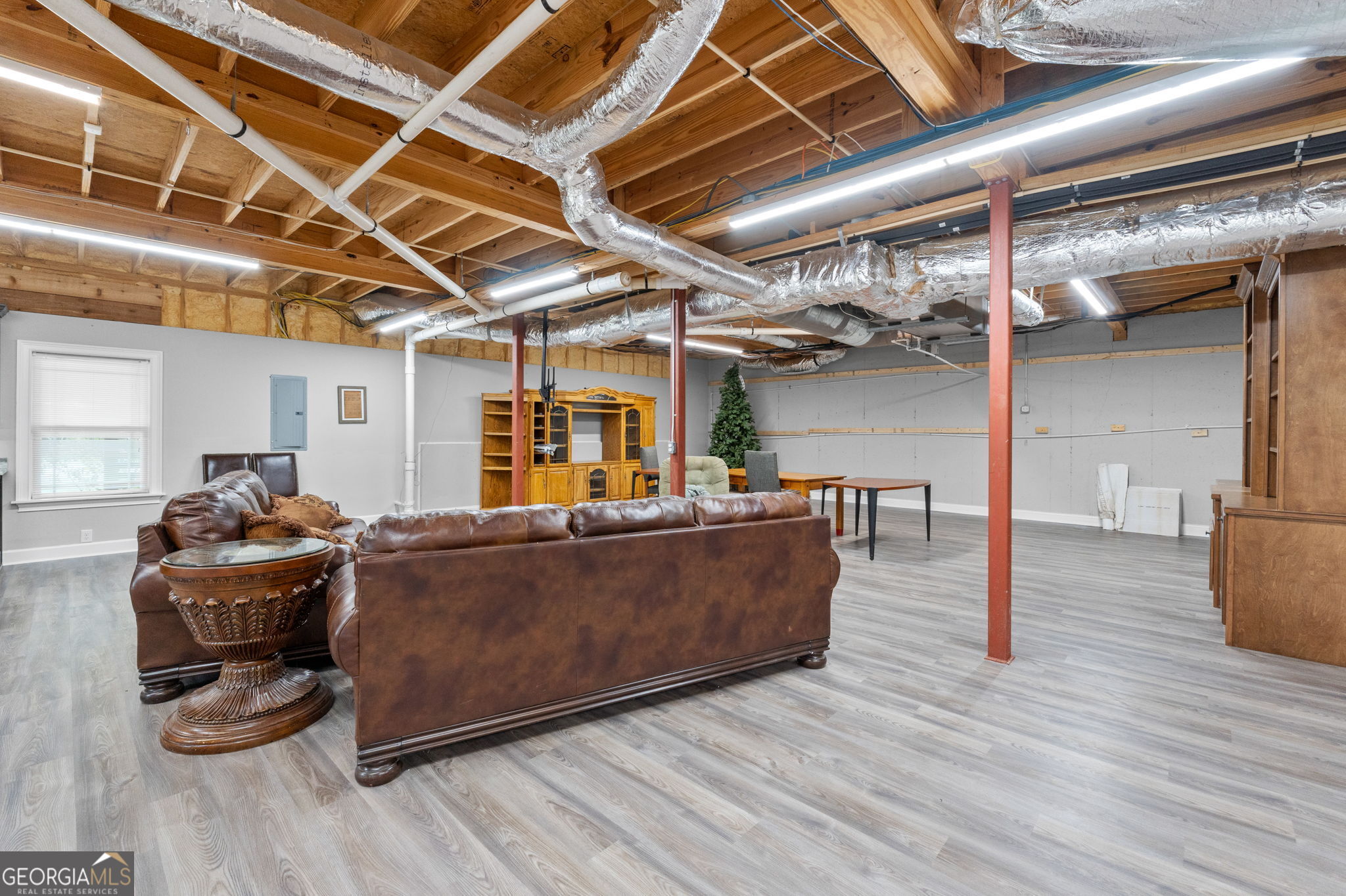 735 Firetower Road Thomaston, GA 30286 - Photo 42 of 112 a living room with furniture and wooden floor