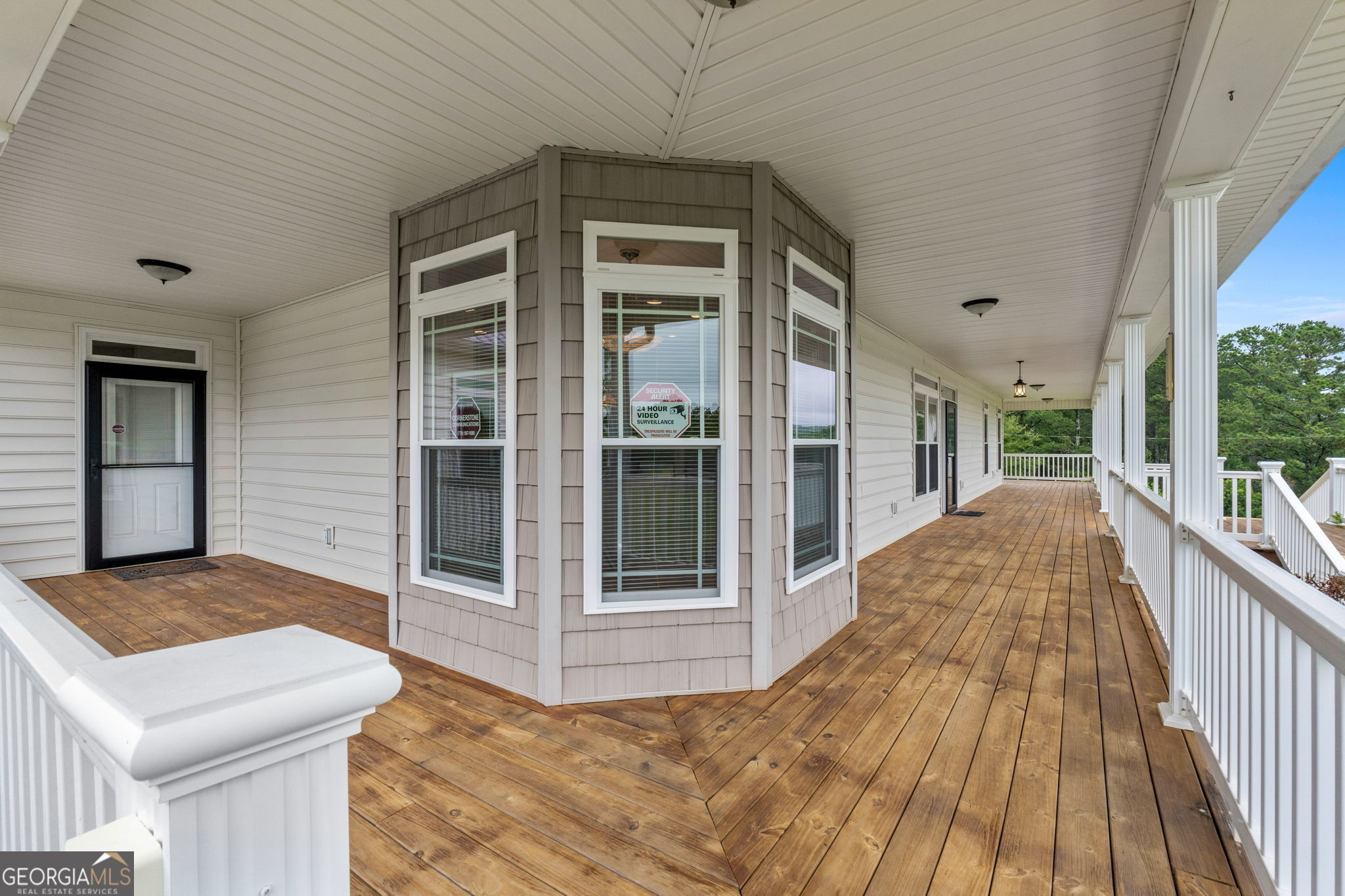 735 Firetower Road Thomaston, GA 30286 - Photo 70 of 112 a view of a balcony with wooden floor and fence