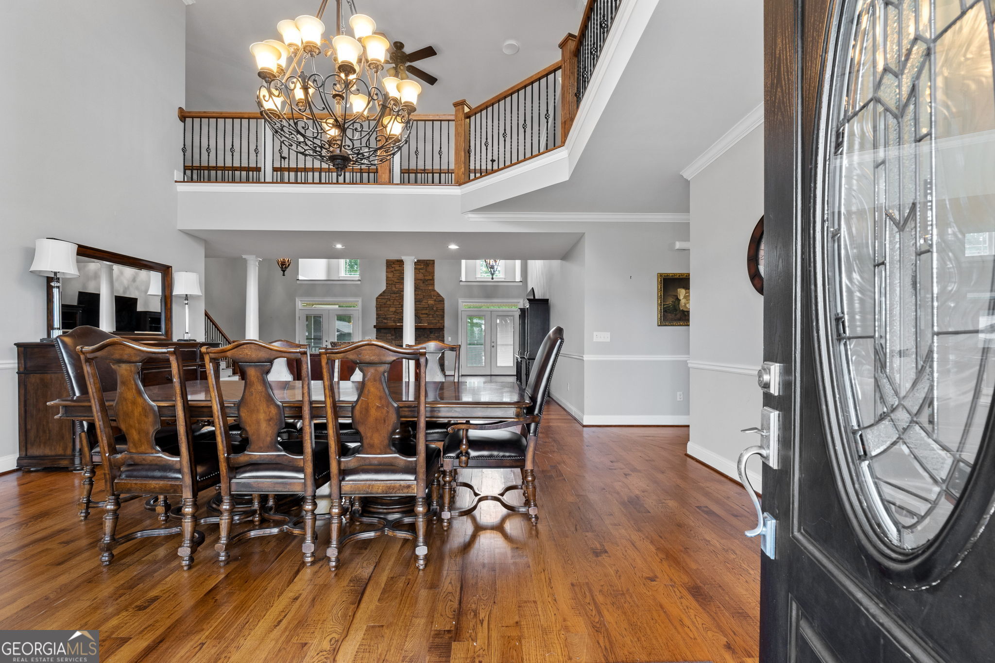 735 Firetower Road Thomaston, GA 30286 - Photo 72 of 112 a view of a dining room with furniture wooden floor and chandelier