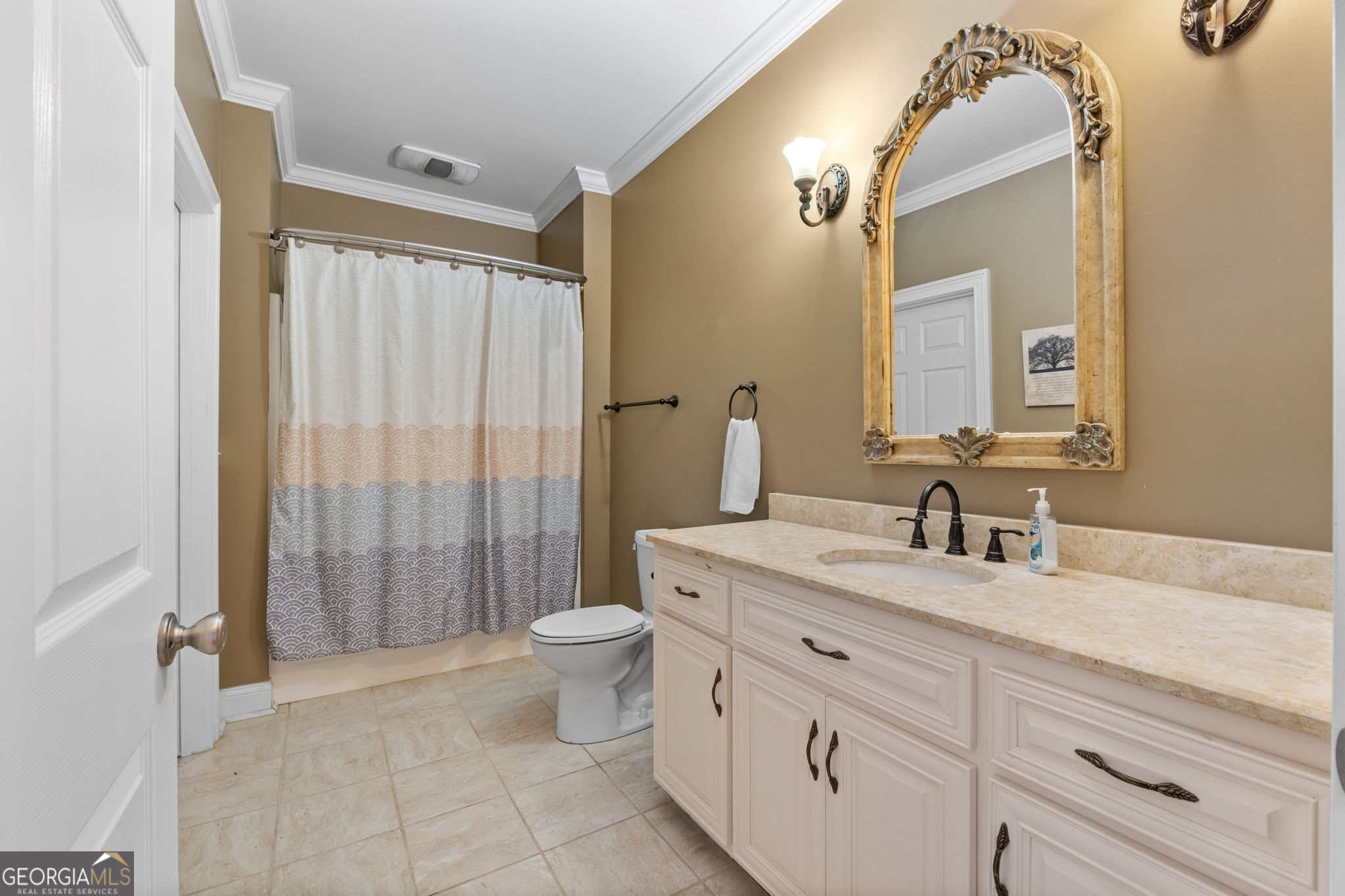 735 Firetower Road Thomaston, GA 30286 - Photo 88 of 112 a bathroom with a granite countertop sink toilet and shower