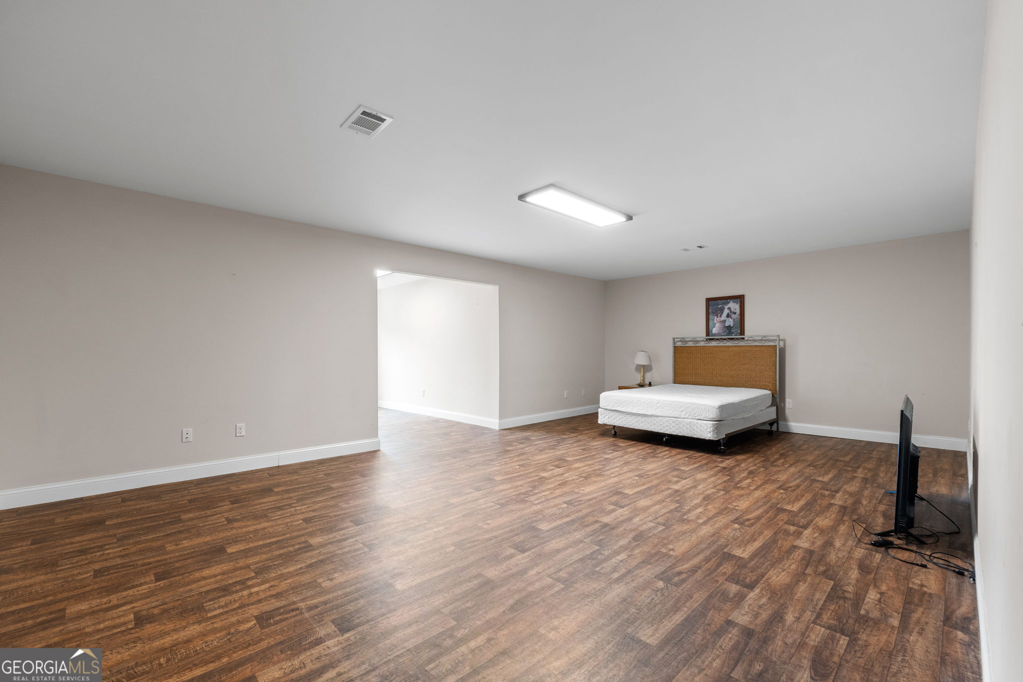 735 Firetower Road Thomaston, GA 30286 - Photo 91 of 112 a view of livingroom with furniture and wooden floor