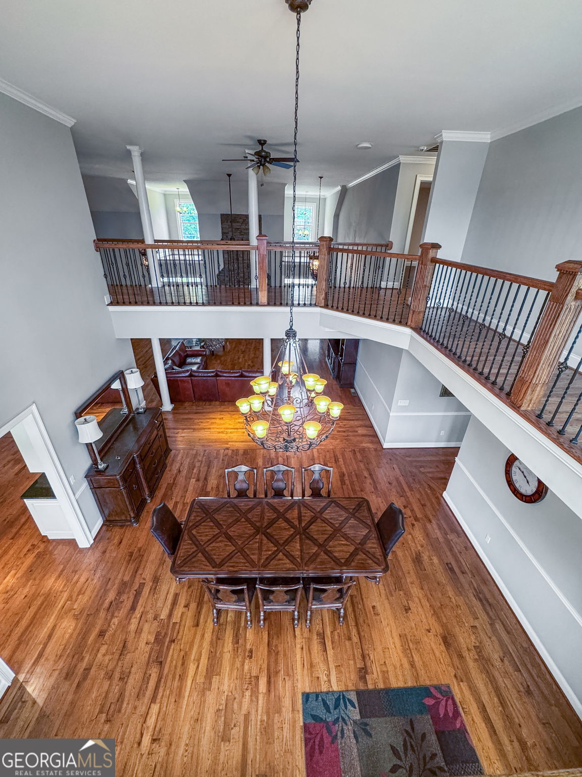 735 Firetower Road Thomaston, GA 30286 - Photo 98 of 112 a view of a dining room with furniture wooden floor and chandelier