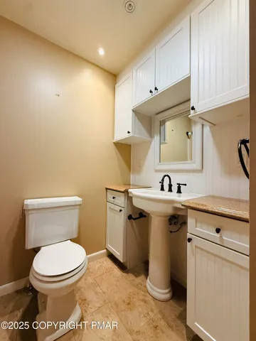 a view of a bathroom with a sink and a toilet