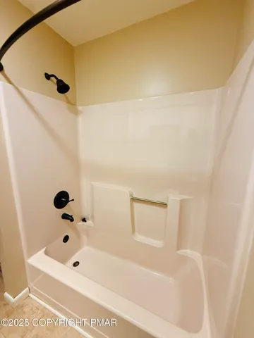 a bathroom with a bathtub