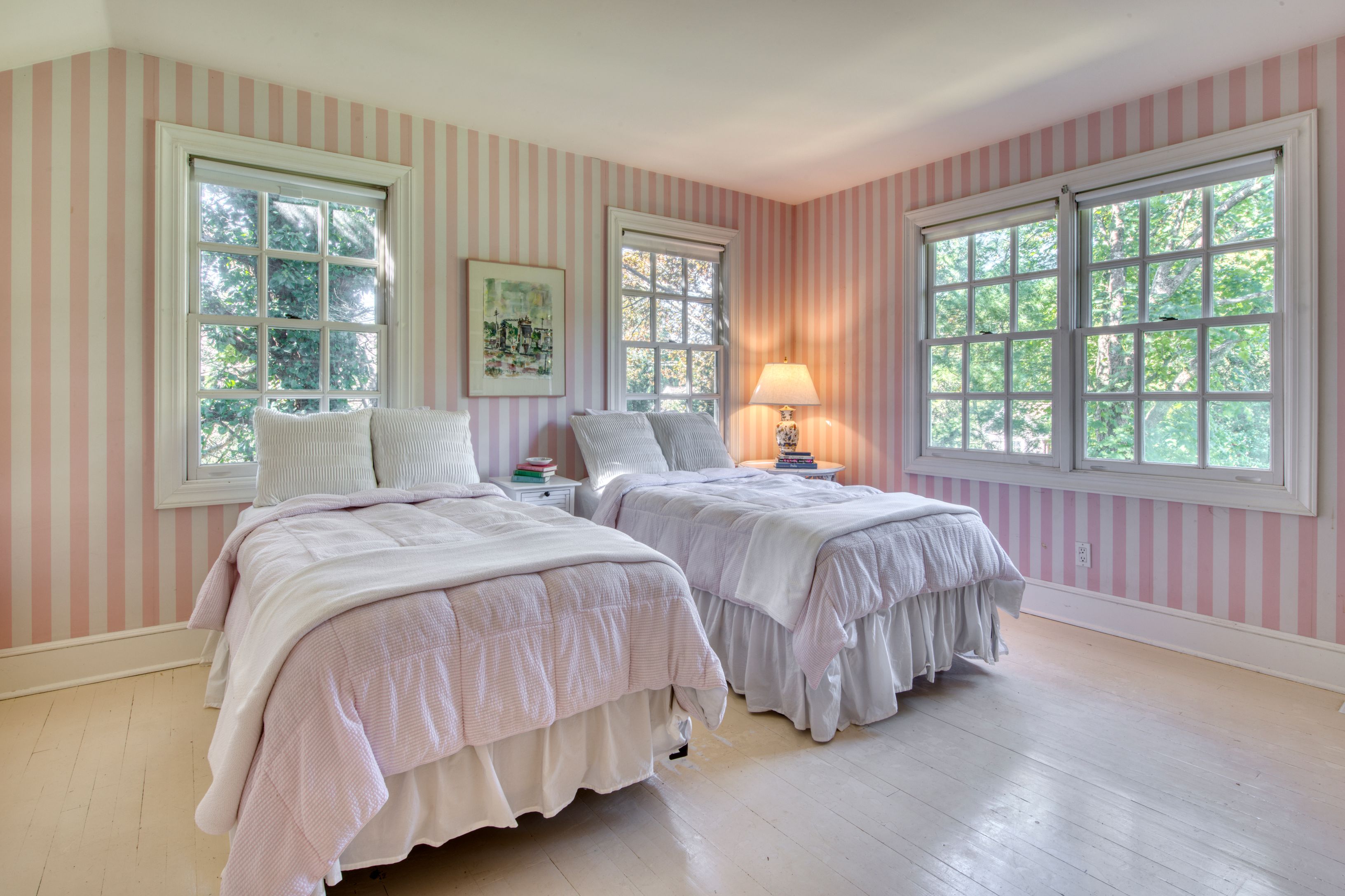65 Skimhampton Road East Hampton, NY 11937 - Photo 12 of 16 a spacious bedroom with two beds and large window