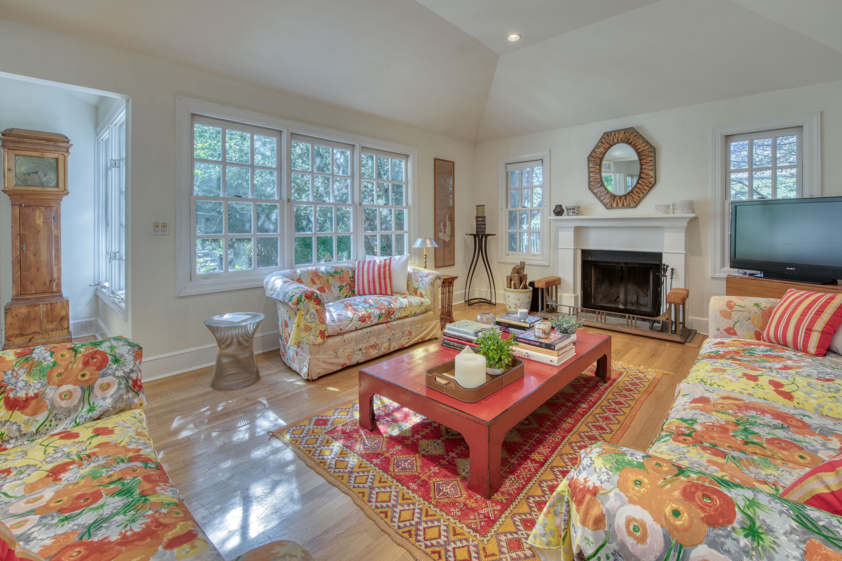 65 Skimhampton Road East Hampton, NY 11937 - Photo 4 of 16 a living room with furniture and a fireplace