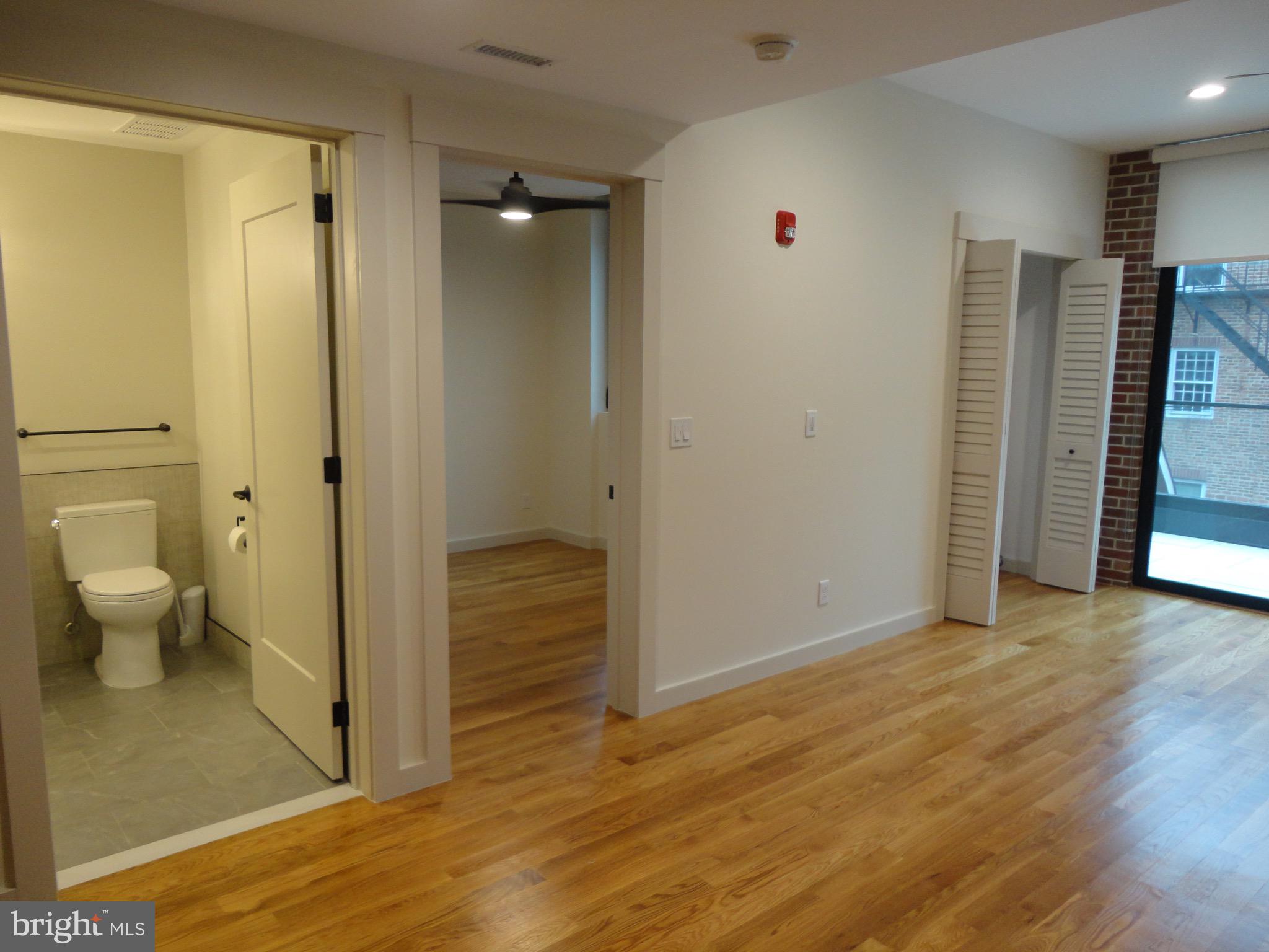 45 Spring Street, Unit 2 Princeton, NJ 08542 - Photo 5 of 22 a view of a bathroom with wooden floor and toilet