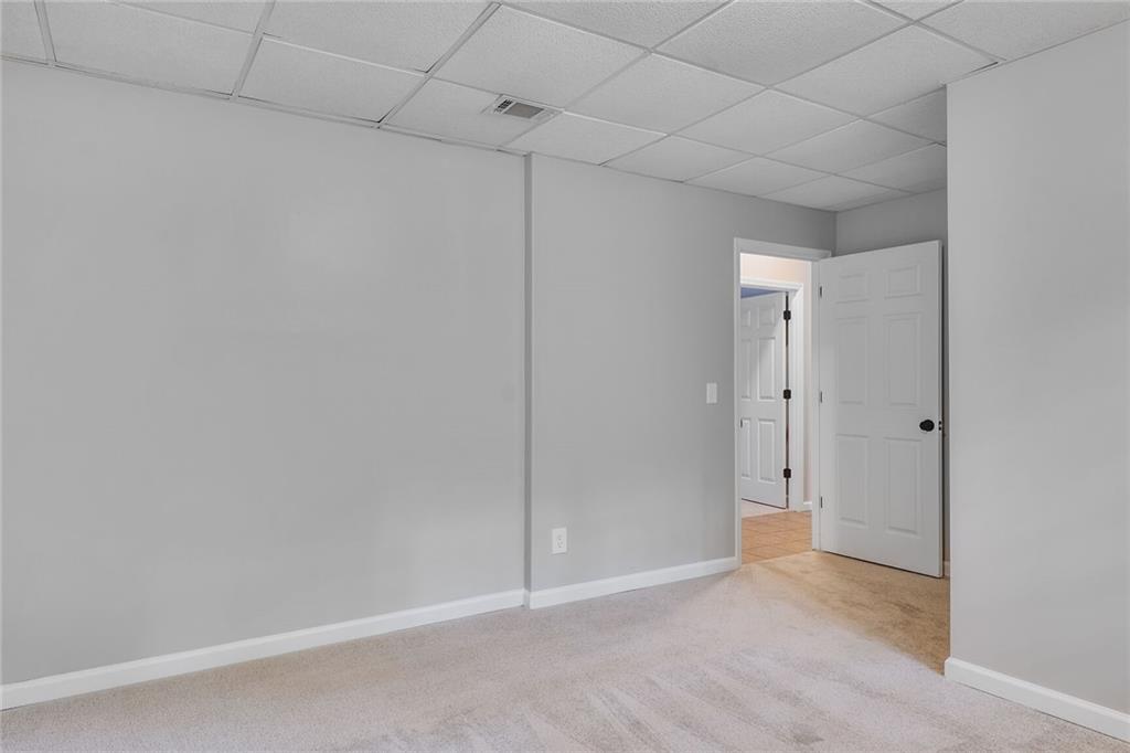 232 Barrett Springs Way Canton, GA 30115 - Photo 20 of 29 a view of an empty room