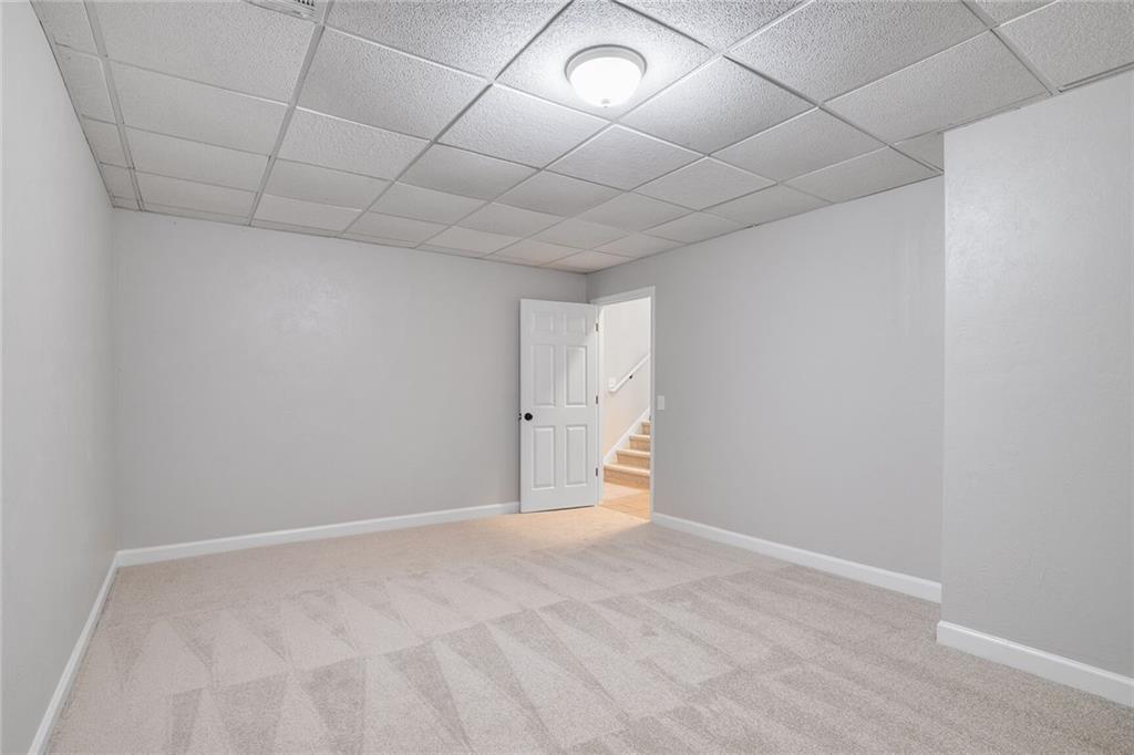 232 Barrett Springs Way Canton, GA 30115 - Photo 23 of 29 a view of an empty room