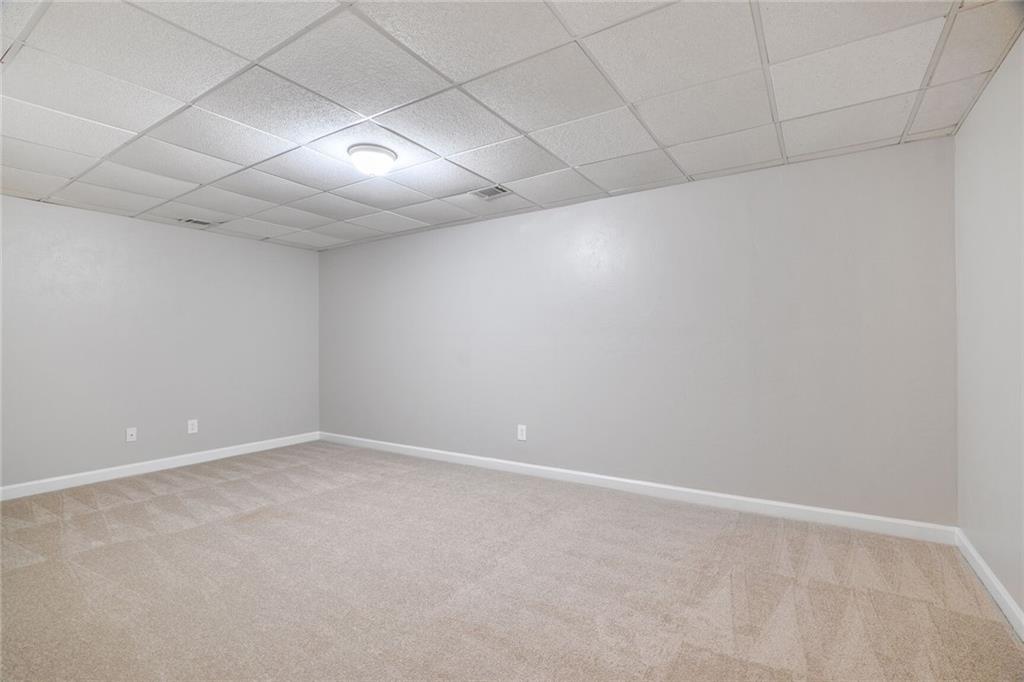 232 Barrett Springs Way Canton, GA 30115 - Photo 24 of 29 a view of empty room